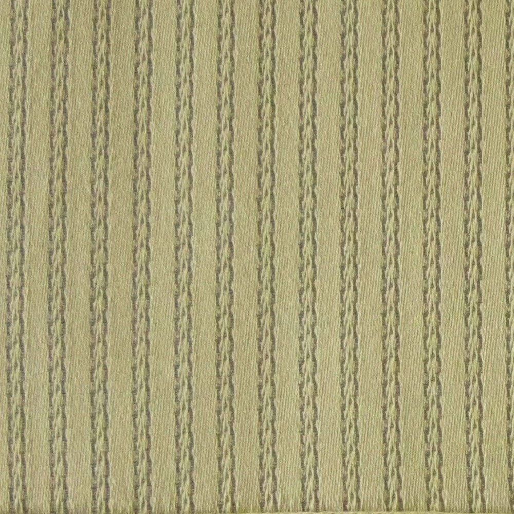Close-up of sage green woven fabric with textured vertical stripe detail.