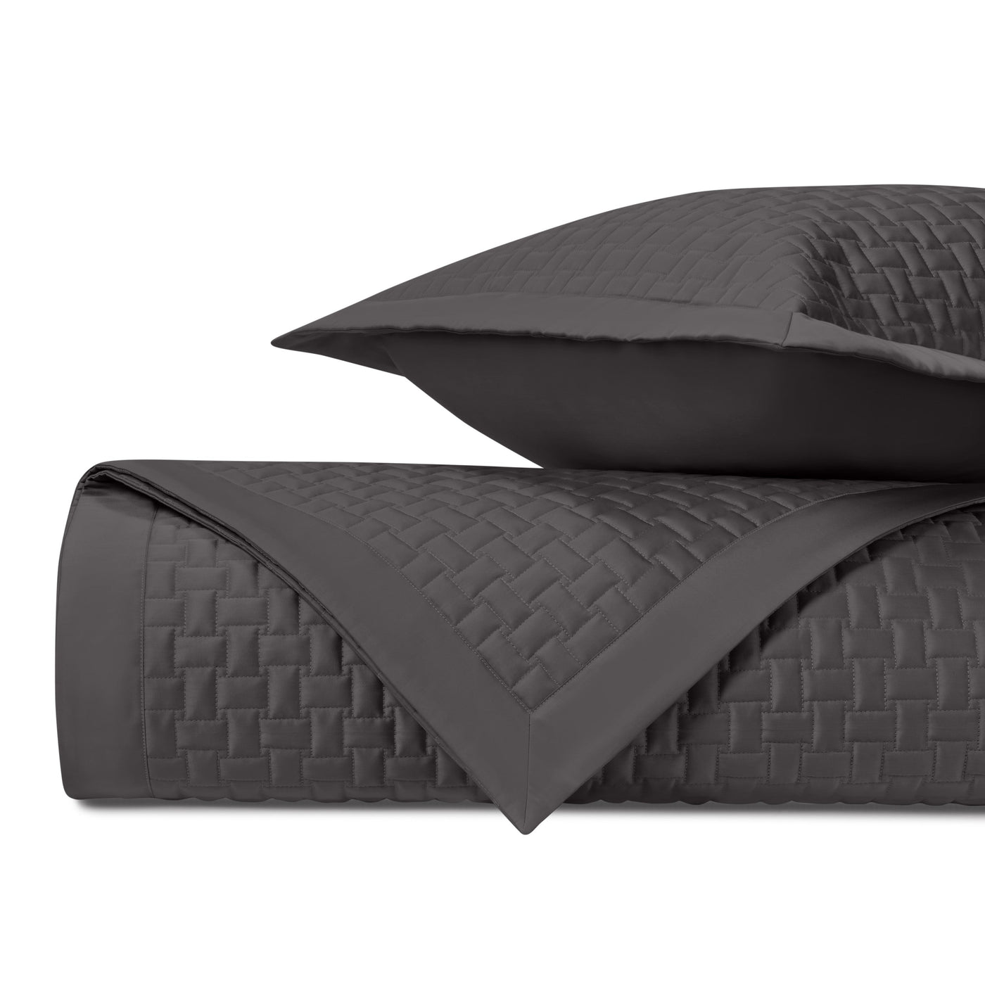 Basket-weave quilted texture detail on charcoal coverlet with coordinating euro sham.