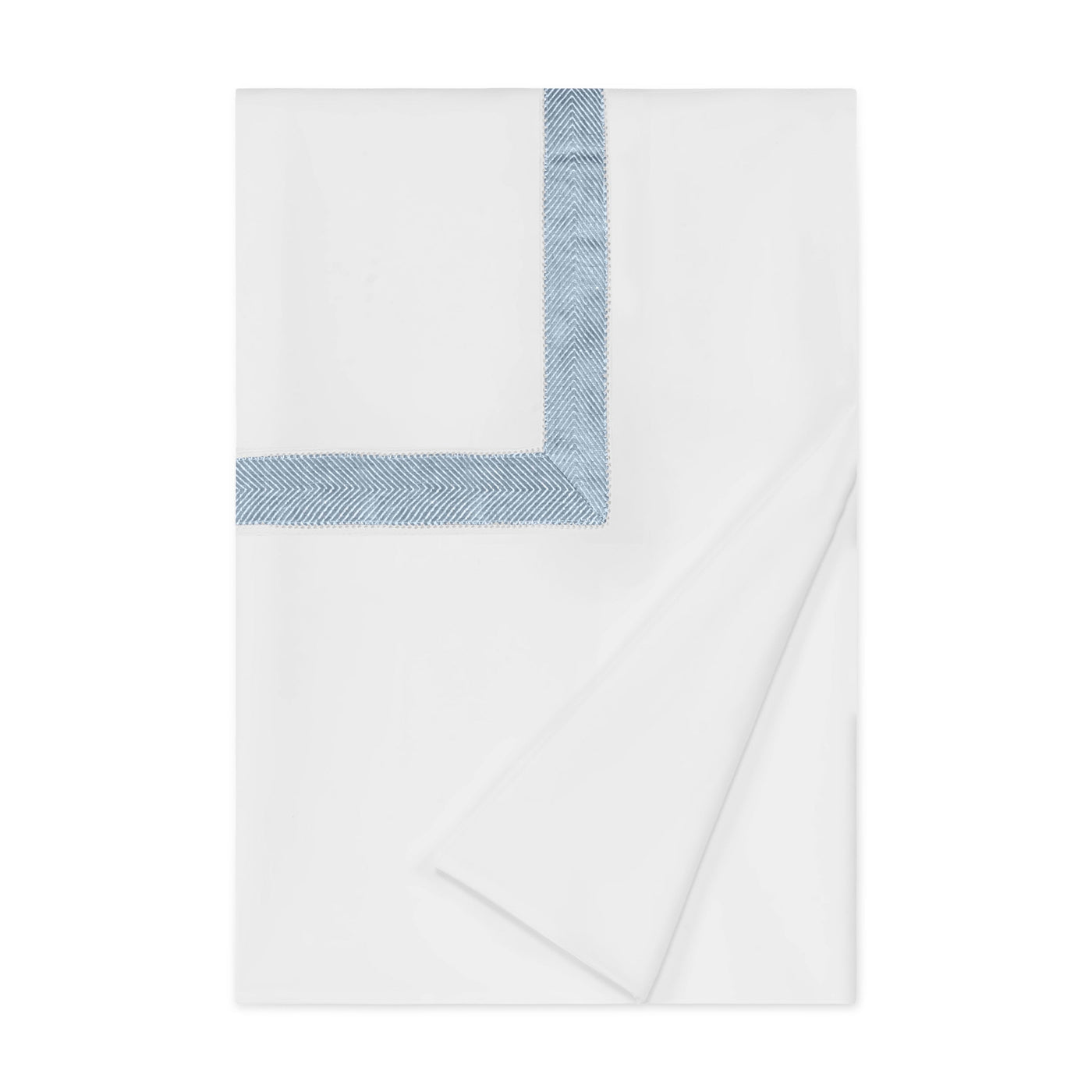 Folded white duvet cover with slate blue herringbone border detail.