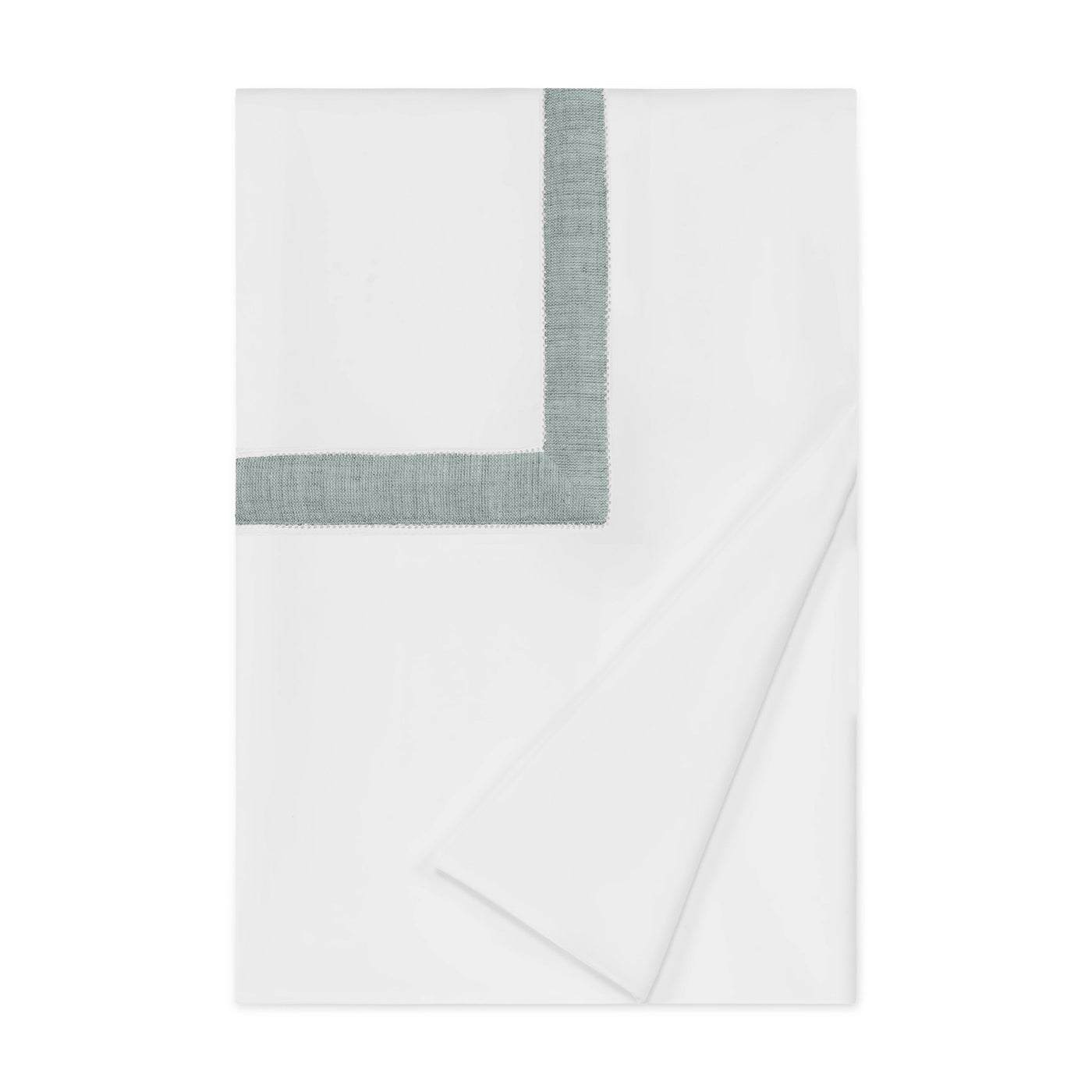 Close-up of sage linen border detail on folded white Home Treasures Yves duvet cover.