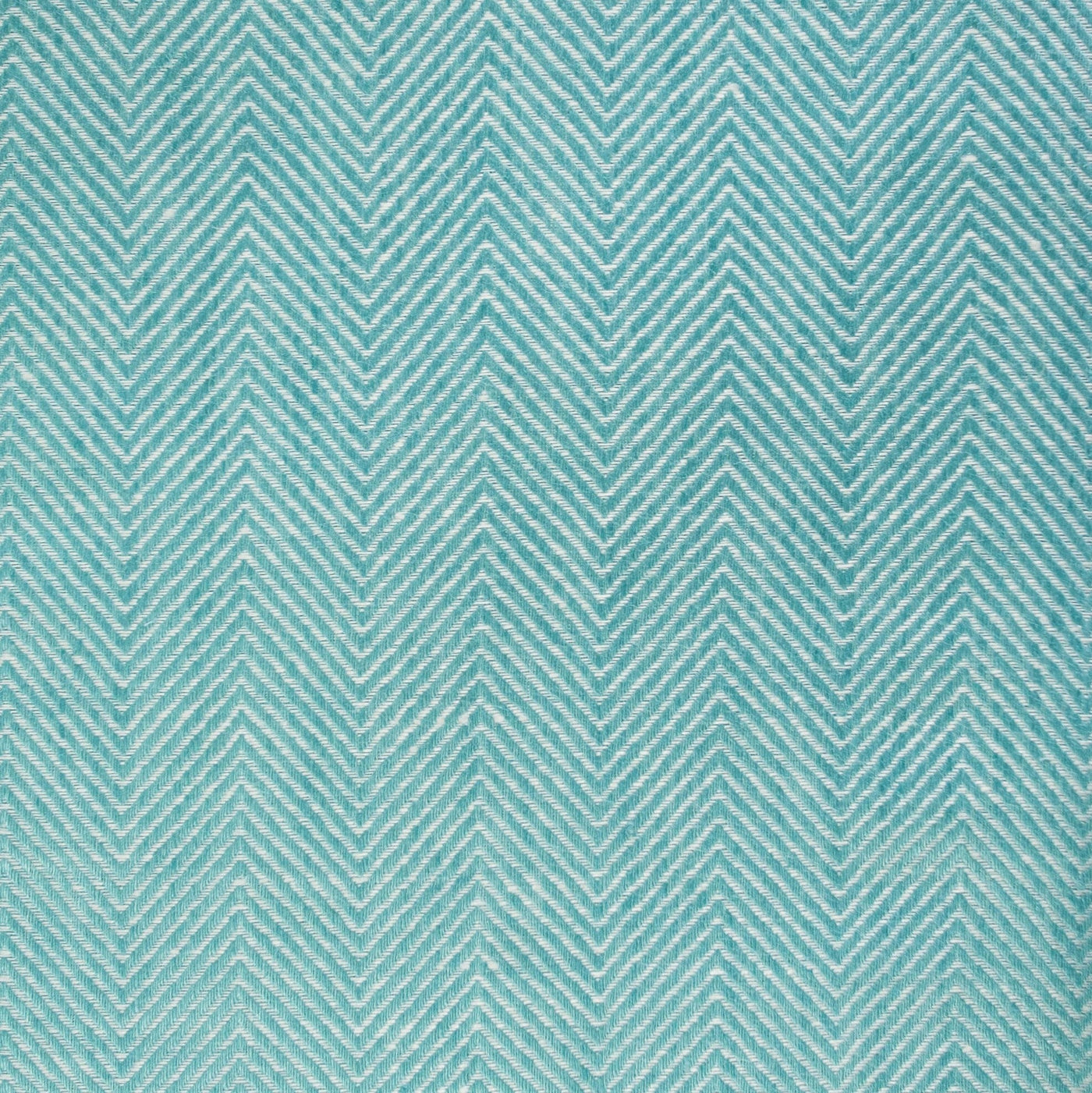 Close-up of Home Treasures Zebra fabric in aqua with woven white chevron pattern.