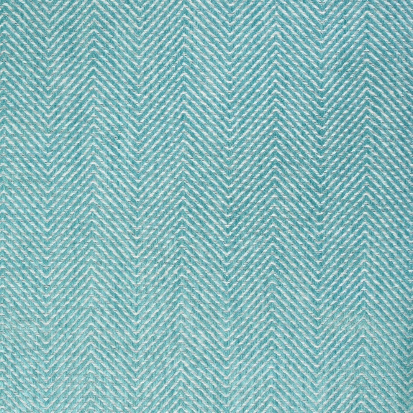 Close-up of aqua and ivory chevron weave texture on Home Treasures Zebra quilted coverlet.