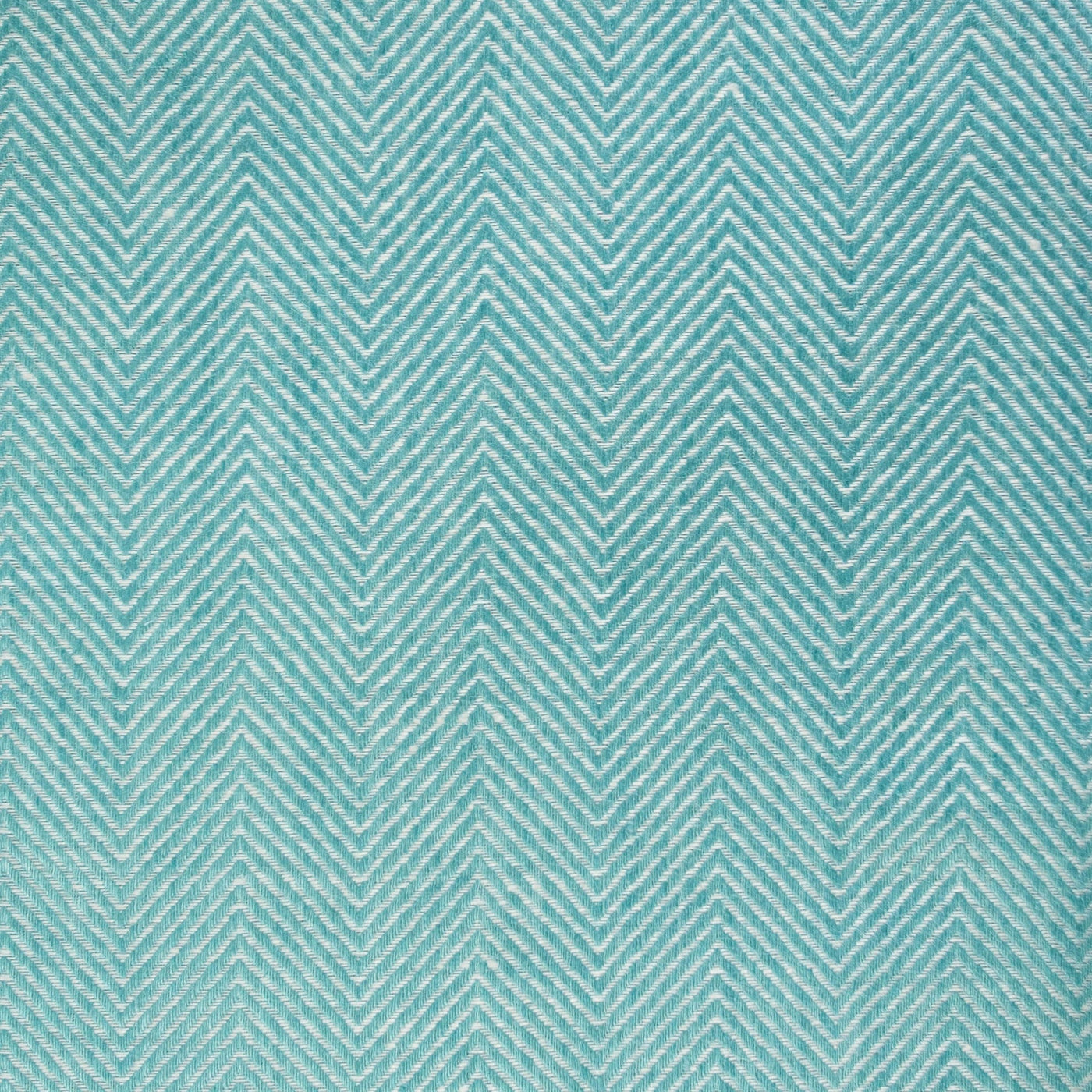 Close-up of Home Treasures Zebra tablecloth in aqua herringbone weave pattern.