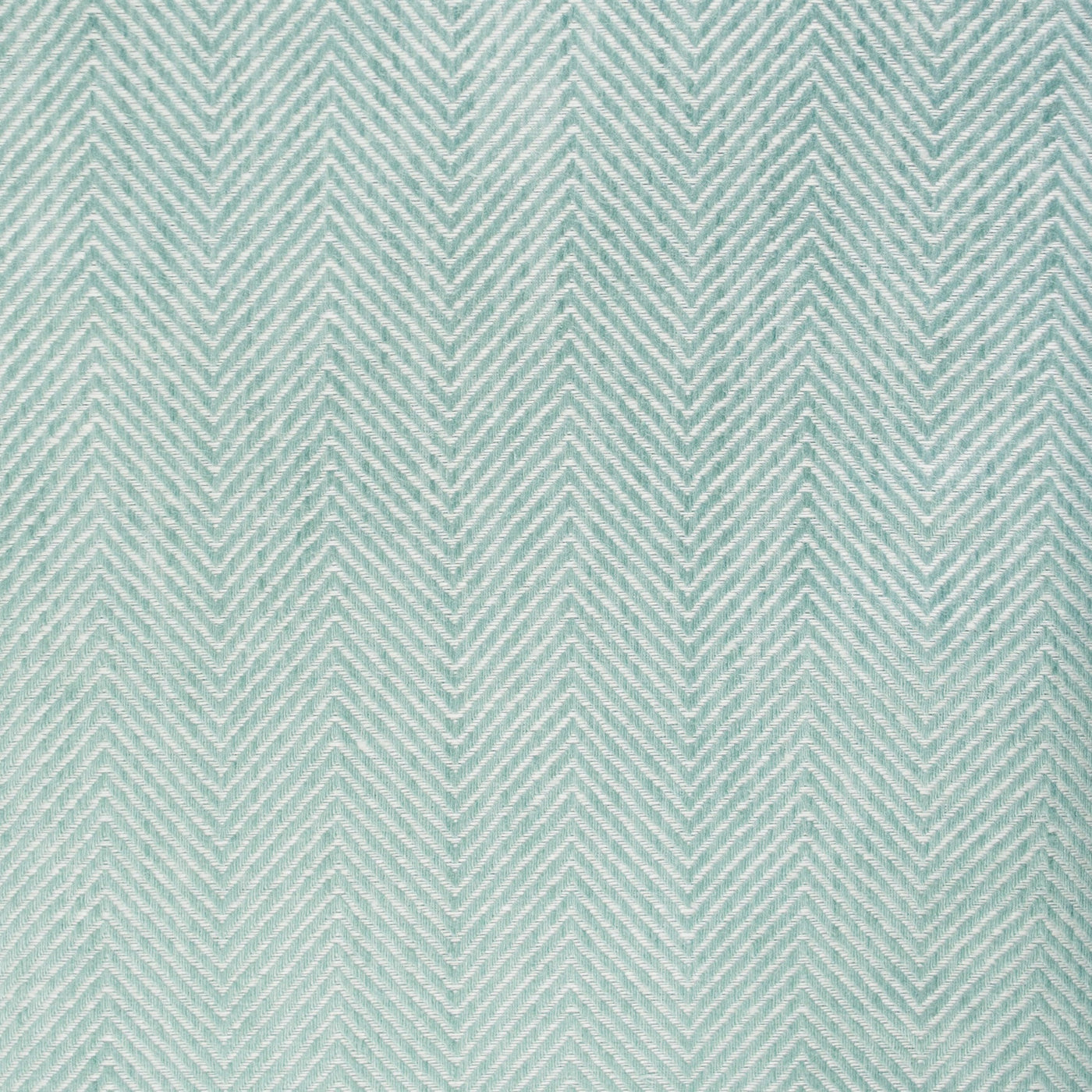 Close-up of aqua and ivory herringbone woven texture on Home Treasures Zebra placemat.