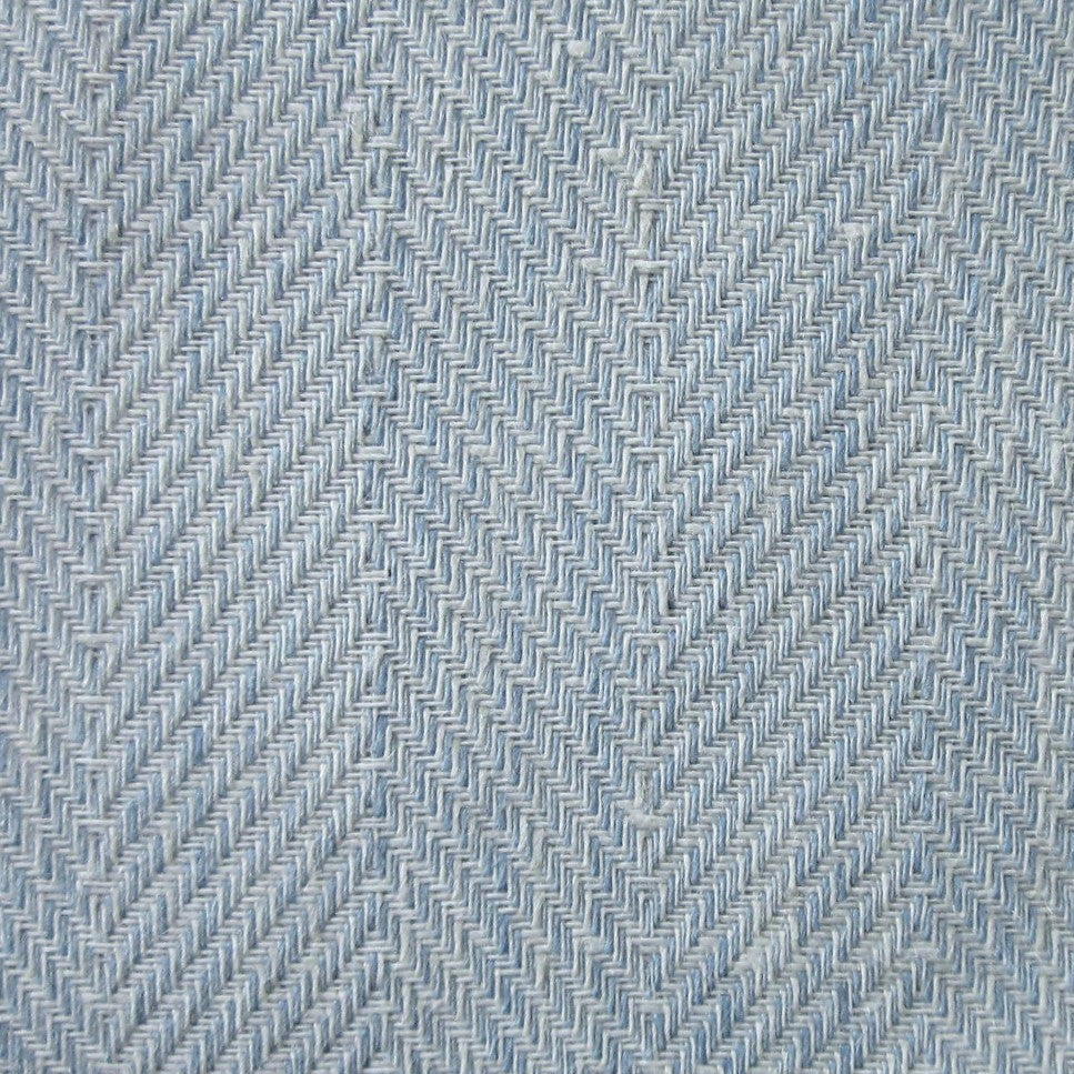 Close-up of sky blue herringbone weave texture on Home Treasures Zebra linen.