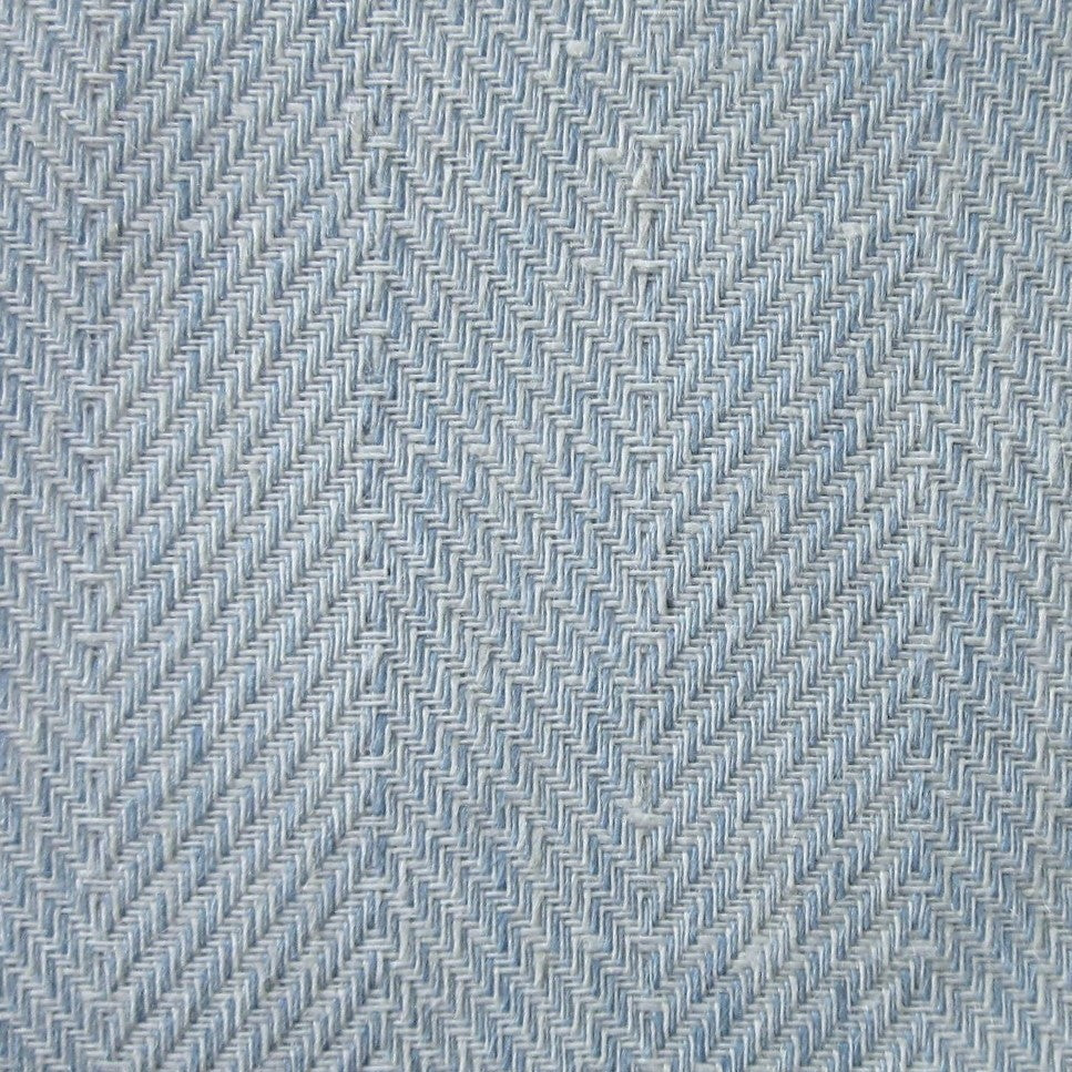 Close-up of steel blue herringbone weave texture on Home Treasures Zebra coverlet.