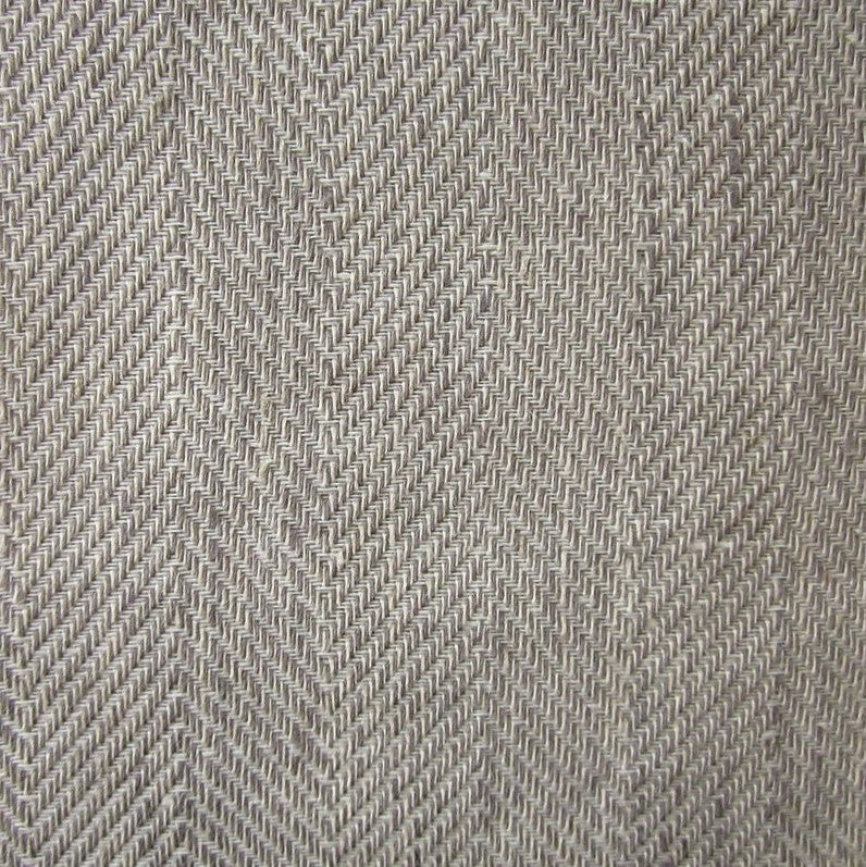 Close-up of Zebra duvet cover's taupe herringbone weave texture.