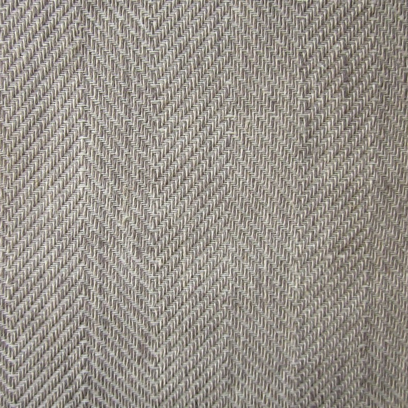 Close-up of taupe herringbone weave texture on Home Treasures Zebra placemat.