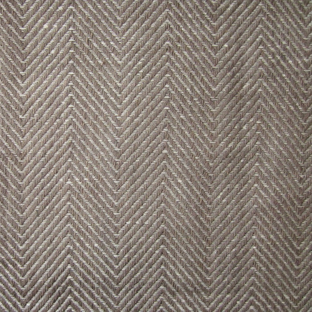 Close-up of taupe herringbone woven texture on a Home Treasures Zebra placemat.