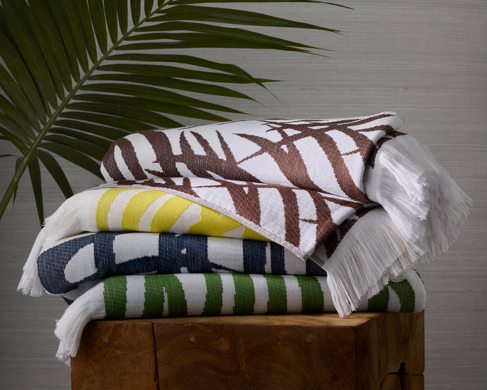 Photo of the Schumacher Zebra Palm | Beach Towel ensemble.