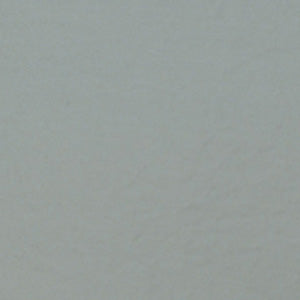 A close-up of the Linen Society Vintage Percale Fitted Sheet showcases its plain, light gray textured surface reminiscent of classic percale bedding.