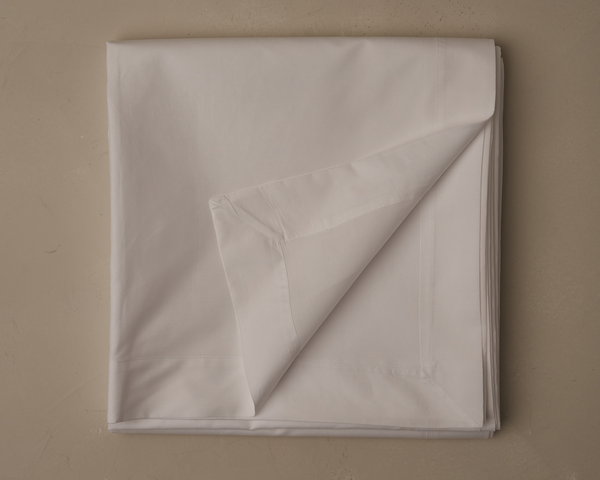 Photo of the Sea Island Percale | Flat Sheet ensemble.