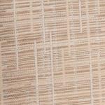 A close-up of the Mosaico Jacquard | Sham Clearance by Clearance, featuring a light-colored woven fabric with a geometric crisscross pattern typical of decorative shams.